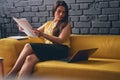 Concentrated brunette female staring at her computer Royalty Free Stock Photo