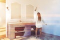 Attic bathroom corner, blue double sink, woman Royalty Free Stock Photo