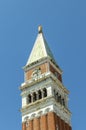 Attic of the bell tower with the lion of Saint Mark and the allegorical figure of Venice as Justice crowned and seated on a