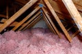 Attic with loose-fill fiberglass insulation