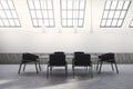 Attic meeting room interior, black chairs