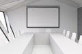 Attic meeting room, white ceiling, poster