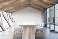 Attic meeting room, wooden ceiling and table