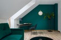 Attic room with emerald colors