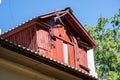 Attic room on the roof, part of the facade of the building, the old wing Royalty Free Stock Photo