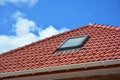 Attic skylight. Roof Tiles House Roofing Construction with Attic Roof windows, skylight waterproofing Royalty Free Stock Photo
