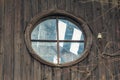 Attic window in a deserted house Royalty Free Stock Photo