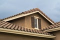 Suburban house attic window exterior view Royalty Free Stock Photo