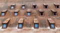 Attic windows and old tiled roof Royalty Free Stock Photo