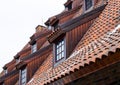 Attic windows and old tiled roof Royalty Free Stock Photo