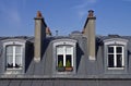 Attic windows in Paris. Royalty Free Stock Photo