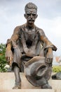 The statue of Attila Jozsef near the building of the Budapest Parliament, on the left bank of the Danube