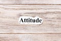 Attitude of the word on paper. concept. Words of Attitude on a wooden background