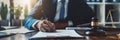 An attorney with a business-like demeanor, using a digital tablet to annotate digital contract documents