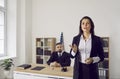 Professional female lawyer appears before jury and provides evidence during trial. Royalty Free Stock Photo