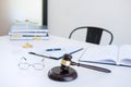 Attorney`s suit, Law books, a gavel and scales of justice on a w Royalty Free Stock Photo