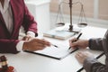 Attorneys advising in cases where a client has been defrauded by a defendant who is a business partner forming a joint company, Royalty Free Stock Photo