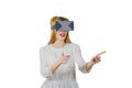 Attracting a young woman in white blouse with a VR headdress, a shocking look of panic on isolates background