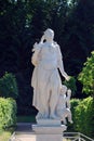 Attractions of the Peterhof Museum-reserve. Sculpture on the alley in the Park.