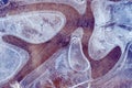 Attractive abstract pattern made of ice in stagnant pools of water