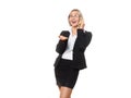 Attractive adult laughing woman in eyeglasses and formal wear talking on the mobile phone and gesturing with her hand Royalty Free Stock Photo