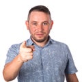 Attractive adult man with stubble in summer shirt shows a finger in your face Royalty Free Stock Photo