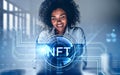 Attractive African American businesswoman working on laptop, non-fungible token hologram, nft with network circuit and globe.
