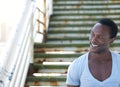 Attractive african american man smiling outdoors Royalty Free Stock Photo