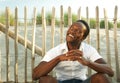 Attractive african american man smiling outdoors Royalty Free Stock Photo