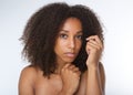 Attractive african american young woman with curly hair
