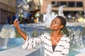 Attractive African woman posing for a selfie Royalty Free Stock Photo