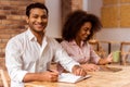 Attractive Afro-American couple working Royalty Free Stock Photo