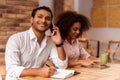 Attractive Afro-American couple working Royalty Free Stock Photo