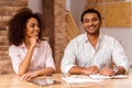 Attractive Afro-American couple working Royalty Free Stock Photo