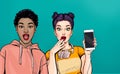 Attractive amazed young women with mobile phone in hand. Wow girls in comic style. Pop art woman holding smartphone. Royalty Free Stock Photo