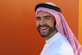 Attractive Arabic man smiling with copy space