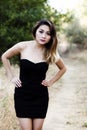 Attractive Asian American Woman Standing Outdoors Black Dress Royalty Free Stock Photo