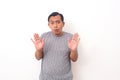 Attractive asian male shows refusal gesture, doesn`t want to participate in meeting, says: It`s not for me, leave me in piece, has