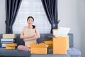 Attractive asian teenage start up running small business owner from home office. Home business concept Royalty Free Stock Photo