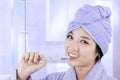 Attractive asian woman brushing teeth Royalty Free Stock Photo