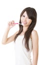 Attractive asian woman brushing teeth Royalty Free Stock Photo