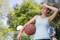 attractive athletic young woman poses outdoors Royalty Free Stock Photo