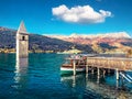 Attractive autumn view of Tower of sunken church in Resia lake. Spectacular morning scene of Italian Alps, South Tyrol, Italy, Eur