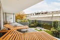 Attractive balcony with dark tiled floor