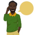 Attractive baldheaded african american hipster man talking on smartphone