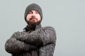 Attractive bearded man standing with arms crossed Royalty Free Stock Photo