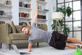 Attractive beared man doing plank exercise at home. Fitness is the key to health Royalty Free Stock Photo