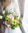 Attractive Beautiful Bride Holding Flowers Bouquet Royalty Free Stock Photo