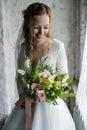 Attractive Beautiful Bride Holding Flowers Bouquet Royalty Free Stock Photo