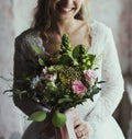 Attractive Beautiful Bride Holding Flowers Bouquet Royalty Free Stock Photo